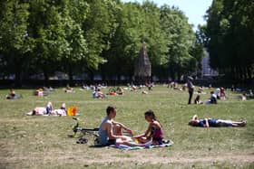 People enjoying warm weather during a heatwave in London. (Photo: Hollie Adams/Getty Images)